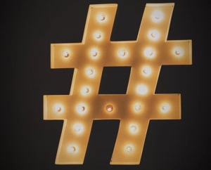 A picture of a pound sign or hashtag symbol that lights up.